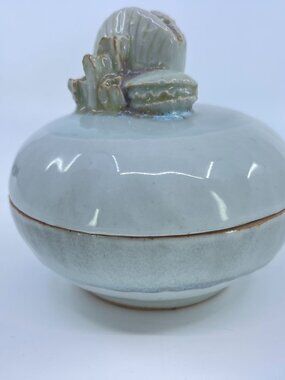 vintage ceramic trinket box with seashell design coastal decor
